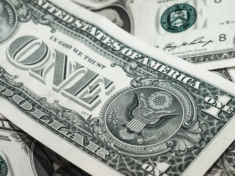 Illustration: A close up view of us one dollar bills
