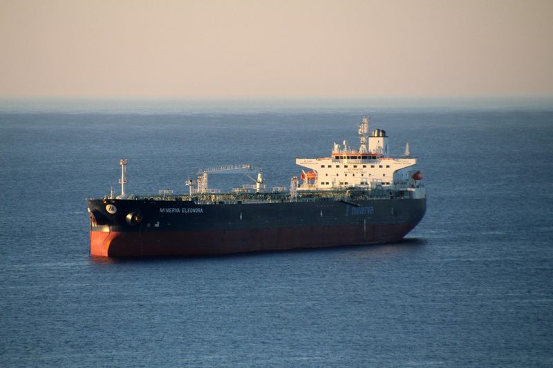 Illustration: A ship sailing on the sea in the distance