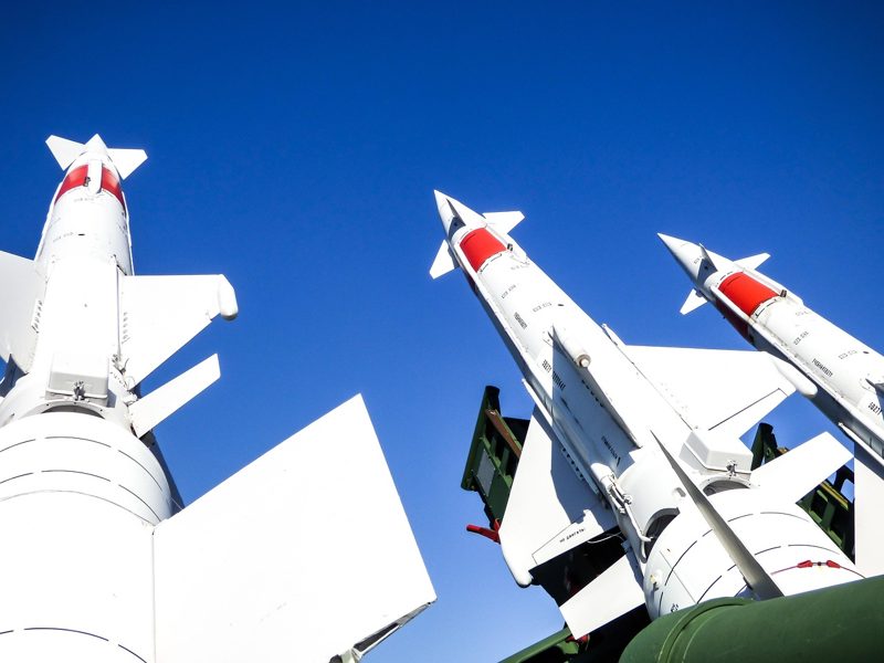 Illustration: Anti-aircraft missiles against a blue sky