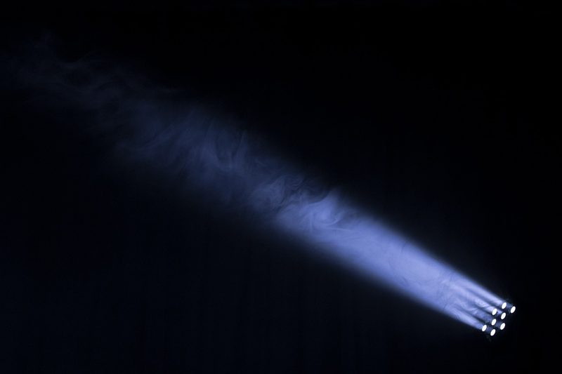 Illustration: A beam of light in a dark room