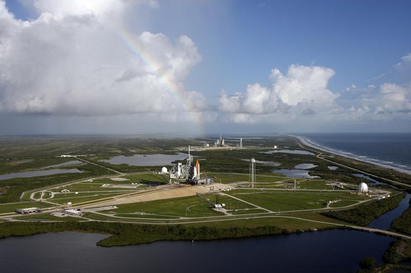 Illustration: The Kennedy Space Center at Cape Canaveral under a cloudy sky