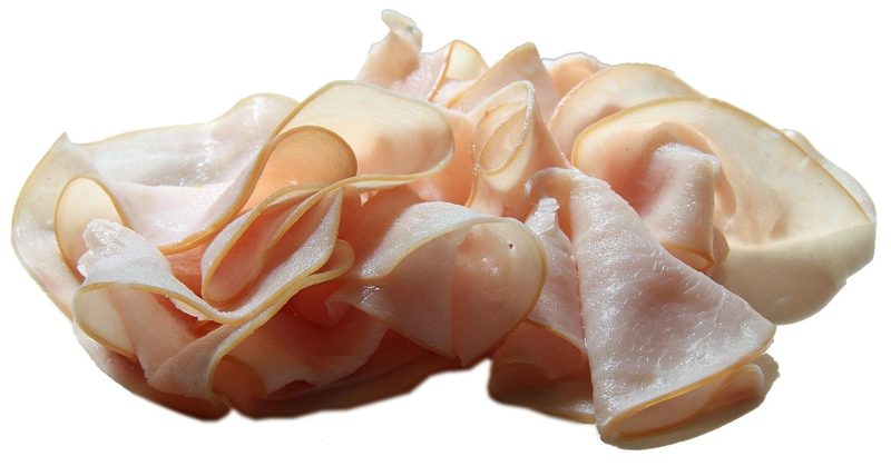 Illustration: A pile of sliced ham on a white background