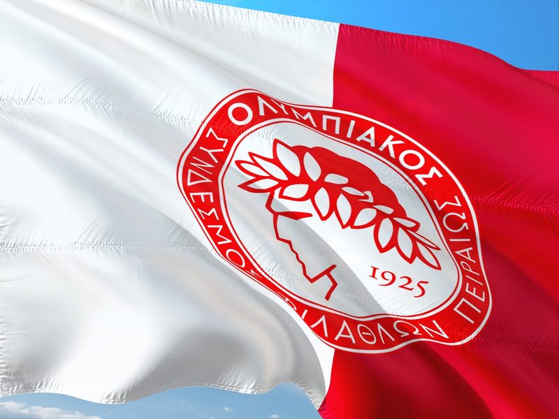 Illustration: A white and red flag with an emblem