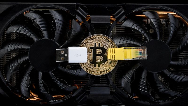 Illustration: A bitcoin token with a USB and an ethernet cable