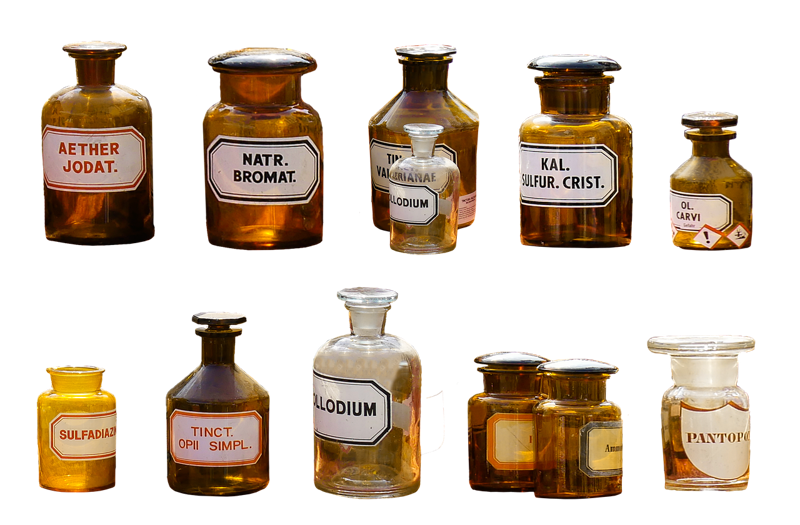 Illustration: A collection of apothecary glass bottles with handwritten labels on them