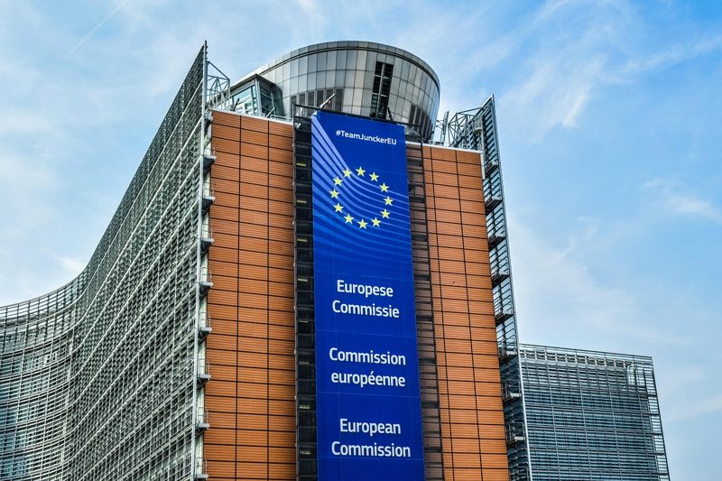 Illustration: The European Commission's Berlaymont building in Brussels with a banner