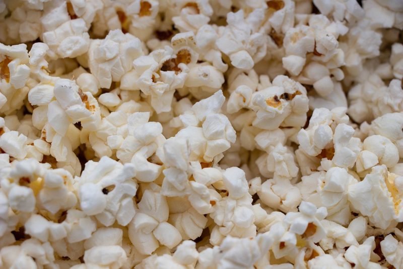 Illustration: A close-up view of a large pile of freshly popped popcorn