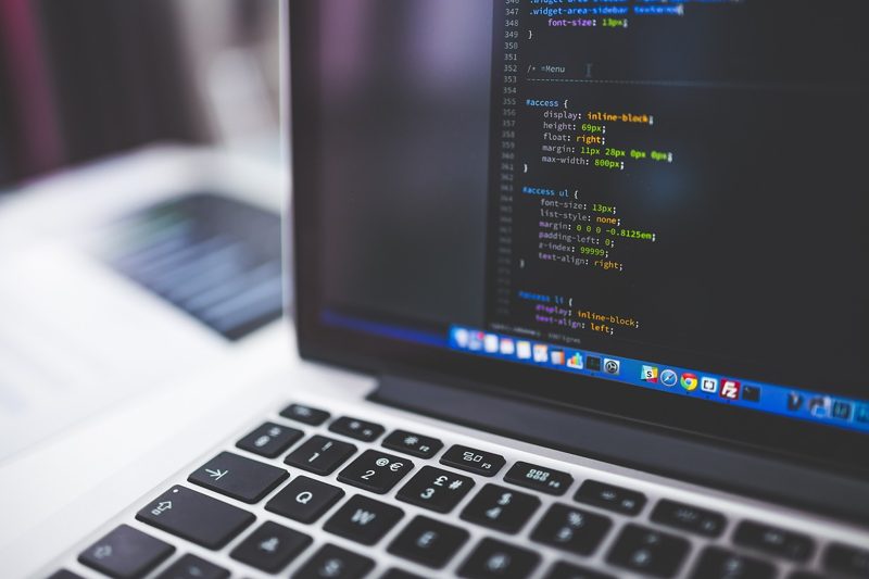 Illustration: A laptop computer displaying code on the screen