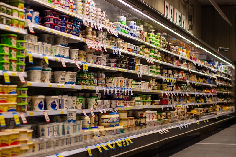 Illustration: Dairy products on shelves in a supermarket