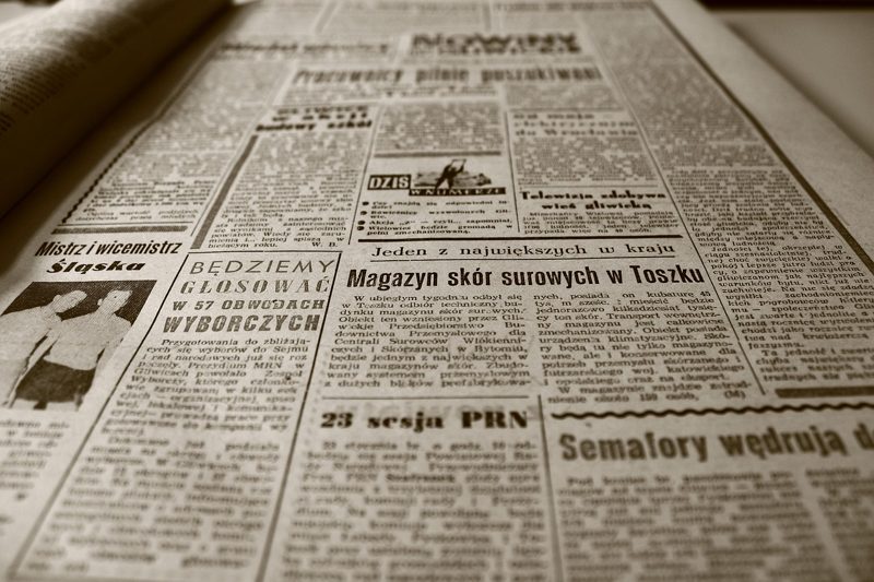 Illustration: An old newspaper page with columns of text